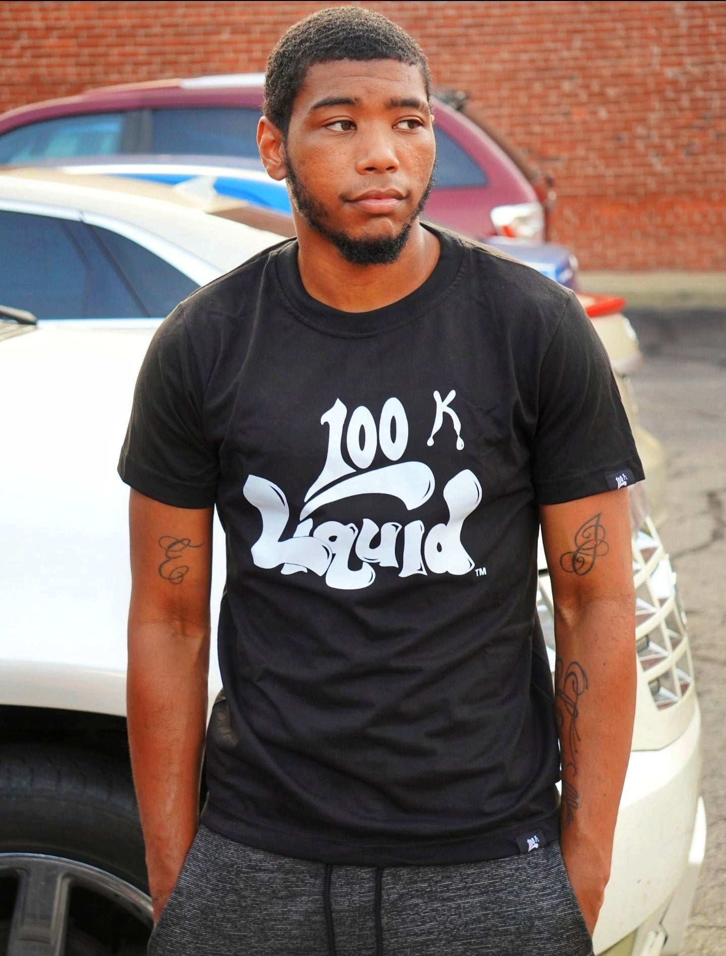 100K Liquid Tee